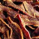 Brown Sugar-Cinnamon Premium Bacon Jerky.
